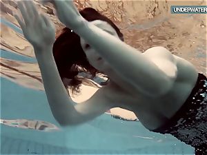 Loris blackhaired teenager swirling in the pool
