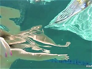 busty blondes Alix and Cherie go skinny dipping