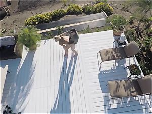 Overhead camera catches Olivia Austin in act